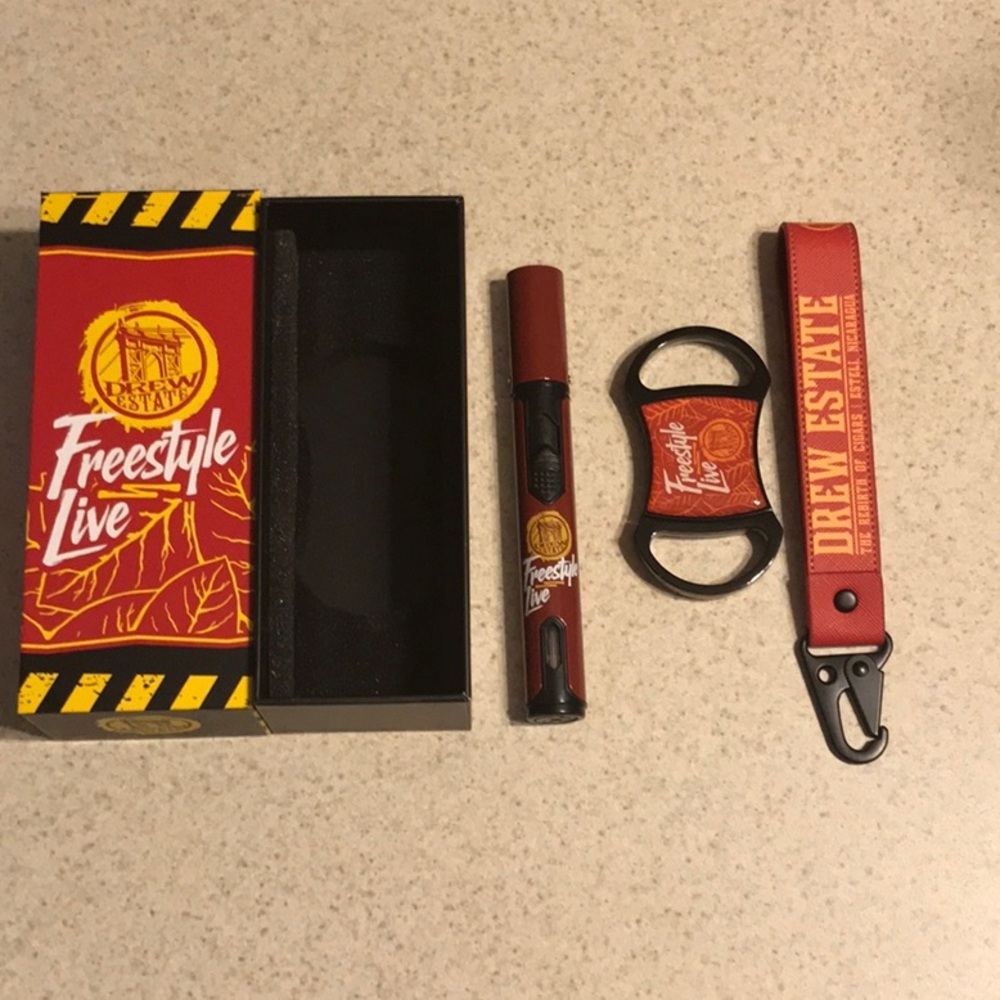 Drew Estate Freestyle Live Swag kit.  Cutter, lighter, key lanyard